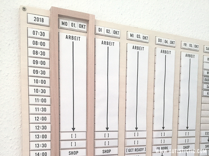 Close up of my planner to show the wooden sliding frame marking the current day.