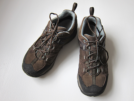 Brown leather lace up hiking shoes.